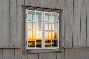 Sunrise in the window of Hunn tingbygning at Gjøvik, Norway.