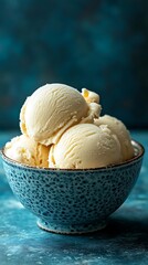 Photo of Scoops of Vanilla Ice Cream in Blue Bowl