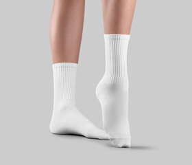 Template of white high gaiters on women's legs, one foot with stretched toes, side view, for design, branding.