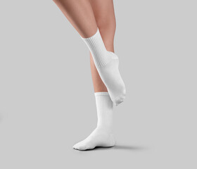 Template of white long socks with high elastic band on female beautiful legs, with stretched toe,...