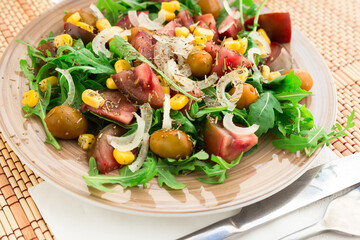 Fresh vegetarian healthy vegetable salad with arugula