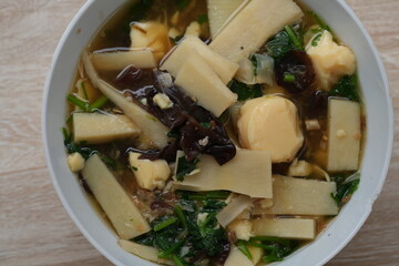 In Thailand, it is called clear soup with bamboo shoots, wood ear mushrooms, and egg tofu.