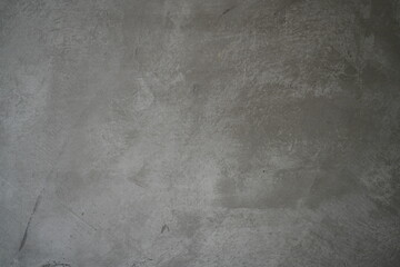 Naklejka premium Cement wall painted in grey and black