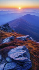 Obraz premium Panoramic view of mountain range during autumn sunrise