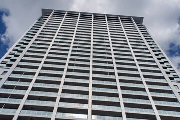 modern office building with clouds