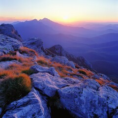 Panoramic view of mountain range during autumn sunrise