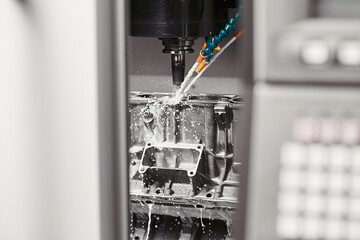 CNC lathe, metal rod drilling lathe using drill tool and drill center. High-tech processing of...