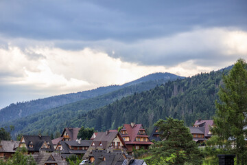 wooden houses with mountain village in the mountains