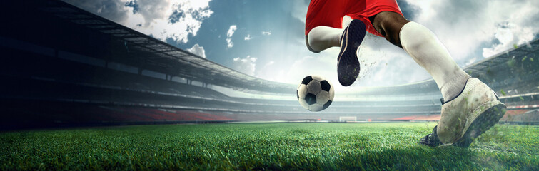3D render of stadium. Close-up cropped image of African soccer player in red, representing team of Spain, launching powerful kick. Concept of sport, tournament, game, event. Banner