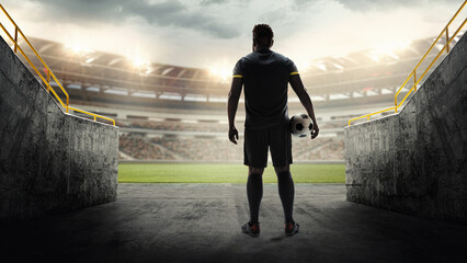 Back view of man, soccer player from Brazil team in dark uniform colors, standing in stadium tunnel, preparing for upcoming match. 3D render of stadium. Concept of sport, tournament, game, event © master1305