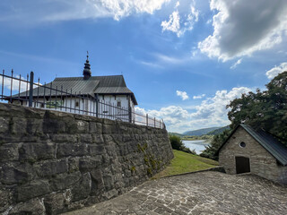 The parish church of Saints Andrew Swierad and Benedict in Tropie - Romanesque church from the turn...