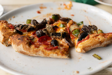 pizza slices with mushrooms and salami