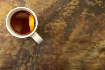 Cuo of rooibos tea on rustic background