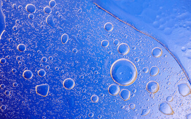 Bubbles on blue background. Abstract oxygen bubble water in sea sponge on blue background.Blue circle bubble water