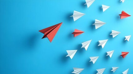 Leadership and business concept,  Red paper leader airplane flying on blue sky of business teamwork and one different vision. Leader, New idea, boss, manager, winner concept, trend.