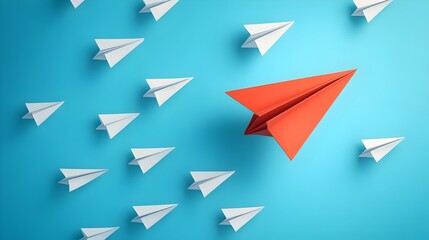 Fototapeta premium Leadership and business concept, Red paper leader airplane flying on blue sky of business teamwork and one different vision. Leader, New idea, boss, manager, winner concept, trend.