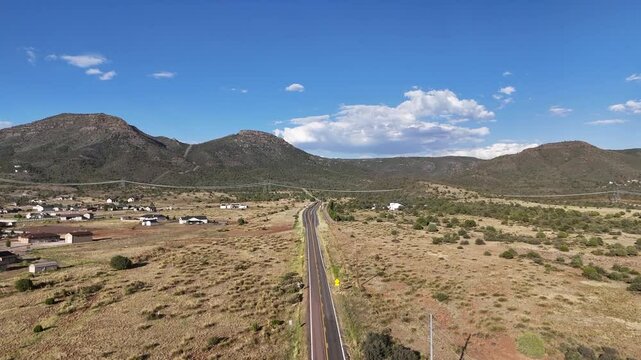 Aerial view of Road that Leads into the Mingus Mountains outside of Prescott Valley in Arizona, Highway 89A