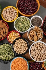 several pots with raw grains for preparing healthy food