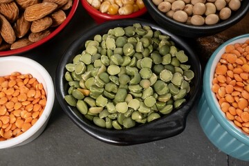 several pots with raw grains for preparing healthy food