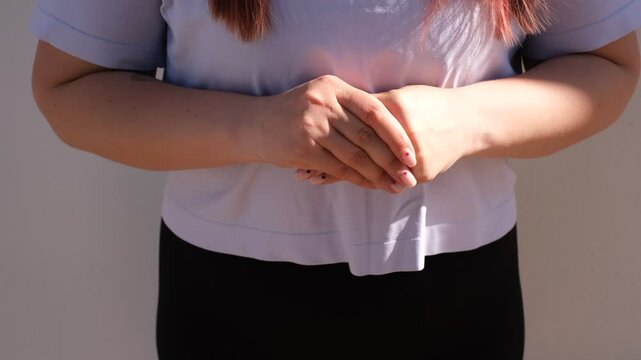 woman is nervous close-up of hands