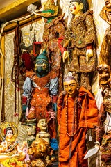 Fototapeta premium Asian style figures in the christmas market in Paris