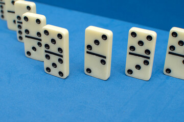 Dominoes bones on blue background	