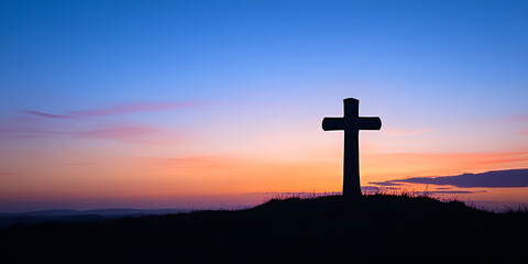 Cross at Sunset in a Serene Landscape