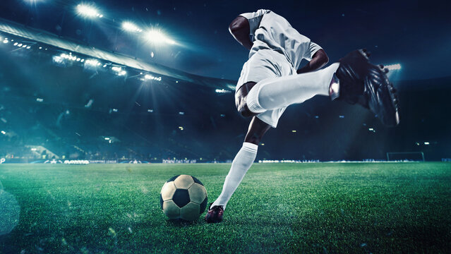 Back view of soccer player in white uniform in motion on open air arena with flashlights, controlling the ball during intense game. 3D render of stadium. Sport, tournament, competition, match concept