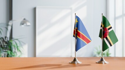 FLAGS OF CONGO DEMOCRATIC REPUBLIC AND DOMINICA ON TABLE
