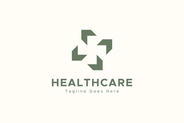 Obraz premium Medical Logo. Green Cross Plus Sign Combined With And Arrows Isolated On White Background. Flat Vector Logo Design Template Element Usable For Healthcare Logos.