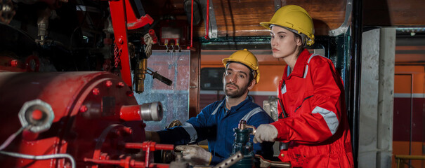 Engineer checking construction process railway and checking work on railroad station . Railway...