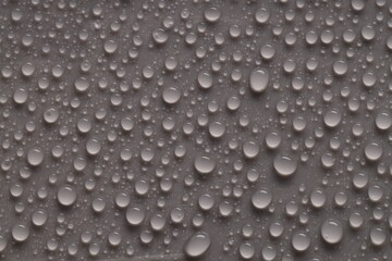 Water drops on gray background, top view