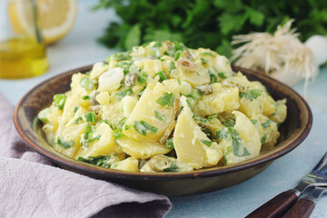 A bowl with Greek potato salads