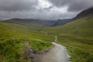 Beautiful walk to the Fairy Pools, the waterfalls that flow from the River Brittle, with the Black...