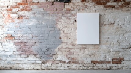 An image featuring a brick wall with a blank square canvas placed slightly off-center, showcasing variations in brick colors and textures with a mix of aged and recently painted bricks.