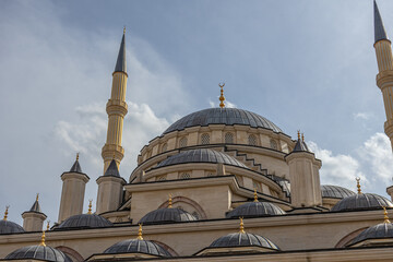 The mosque is made in the classic Ottoman style. View of the grand Mosque. A mosque with minarets...