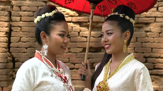 Myanmar Women in traditional Myanmar suit sightseeing in Myanmar 