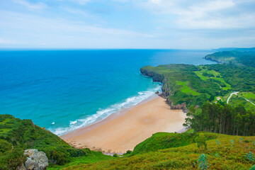 Obraz premium Wild shores with beaches, rocks and cliffs along the coast of northern Spain, September, 2024