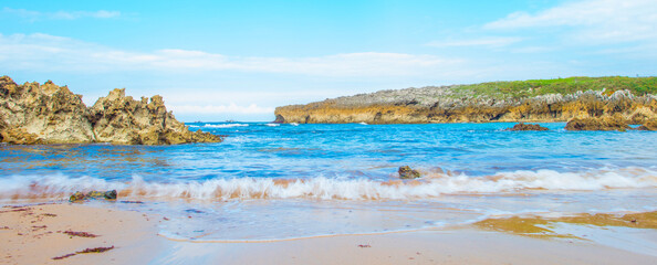 Wild shore with rocks and stones along the coast of northern Spain, Muxia, Galicia, September 12, 2024