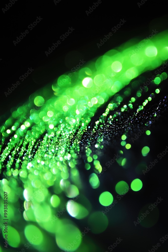 Aufkleber a close-up of a shimmering dark green background with sparkling bokeh effects.