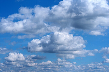 blue sky and many cumulus clouds