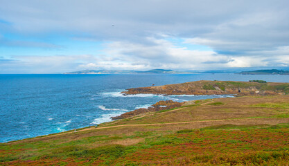 Wild shore with rocks and stones along the coast of northern Spain, Muxia, Galicia, September 12, 2024