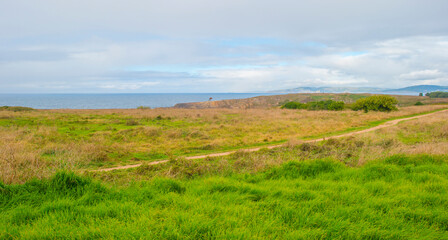 Wild shore with rocks and stones along the coast of northern Spain, Muxia, Galicia, September 12, 2024