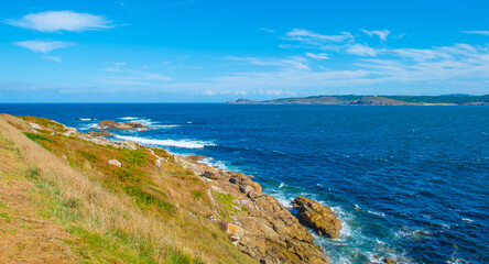 Wild shore with rocks and stones along the coast of northern Spain, Muxia, Galicia, September 12, 2024