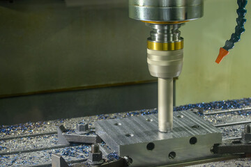 The CNC milling machine rough cutting the injection mold parts by indexable tools.