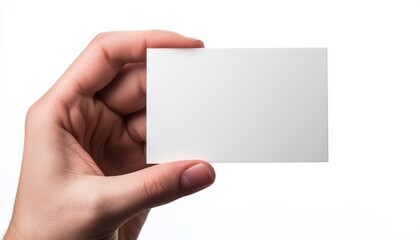 Hand holding a blank business card on white background