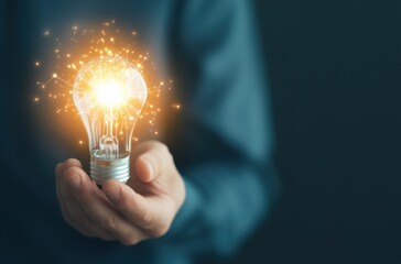 Businessman Holding Light Bulb with Digital Technology Glowing Inside   Innovation  AI  Bu