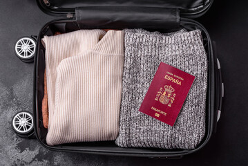 International passport of a citizen of Spain on a suitcase