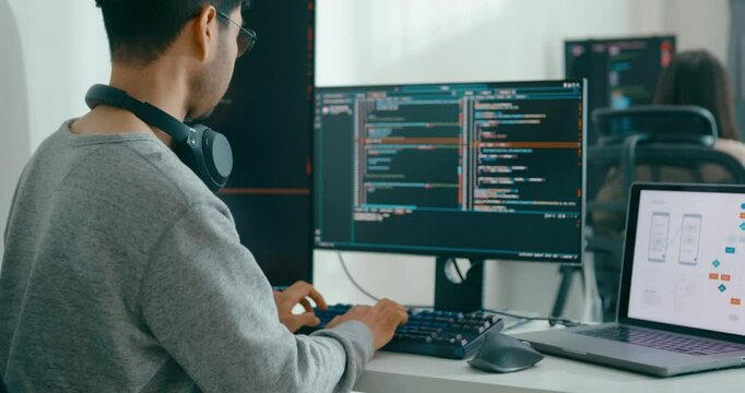 Group Adult Asia male, female freelance typing write prompt AI bot IT app smart program nomad, video game, terminal with coding language, user interface, designer, big data center on desktop computer.