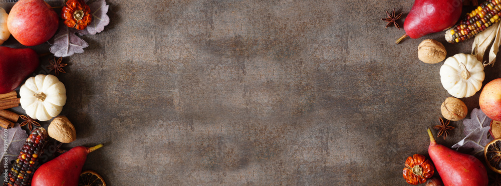Poster autumn border of pumpkins, leaves and baking spices. double border on a dark stone banner background